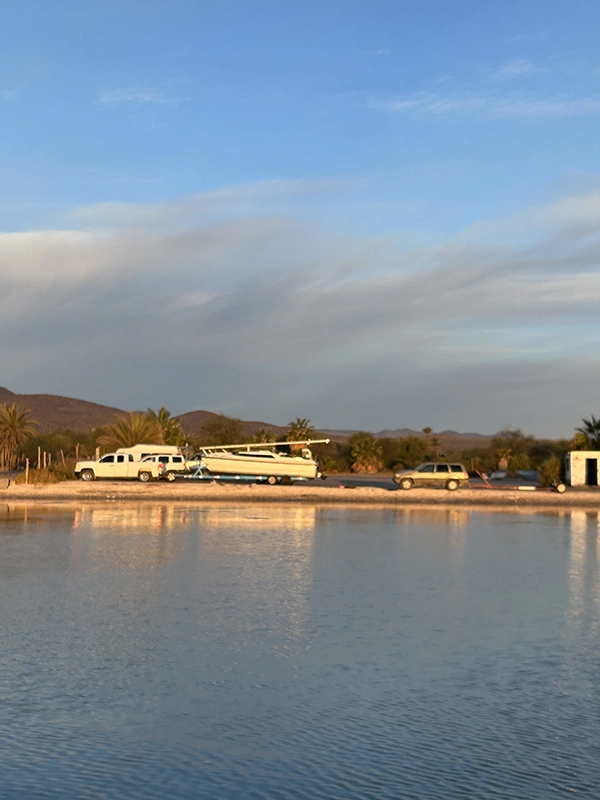 view of a shoreline and a boat from the water